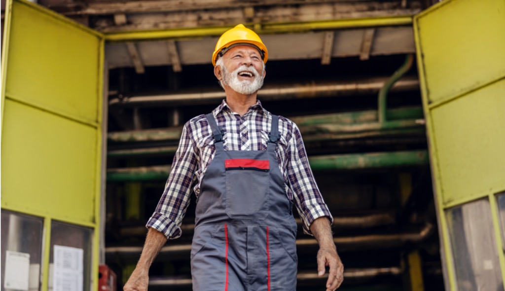 Happy senior factory worker