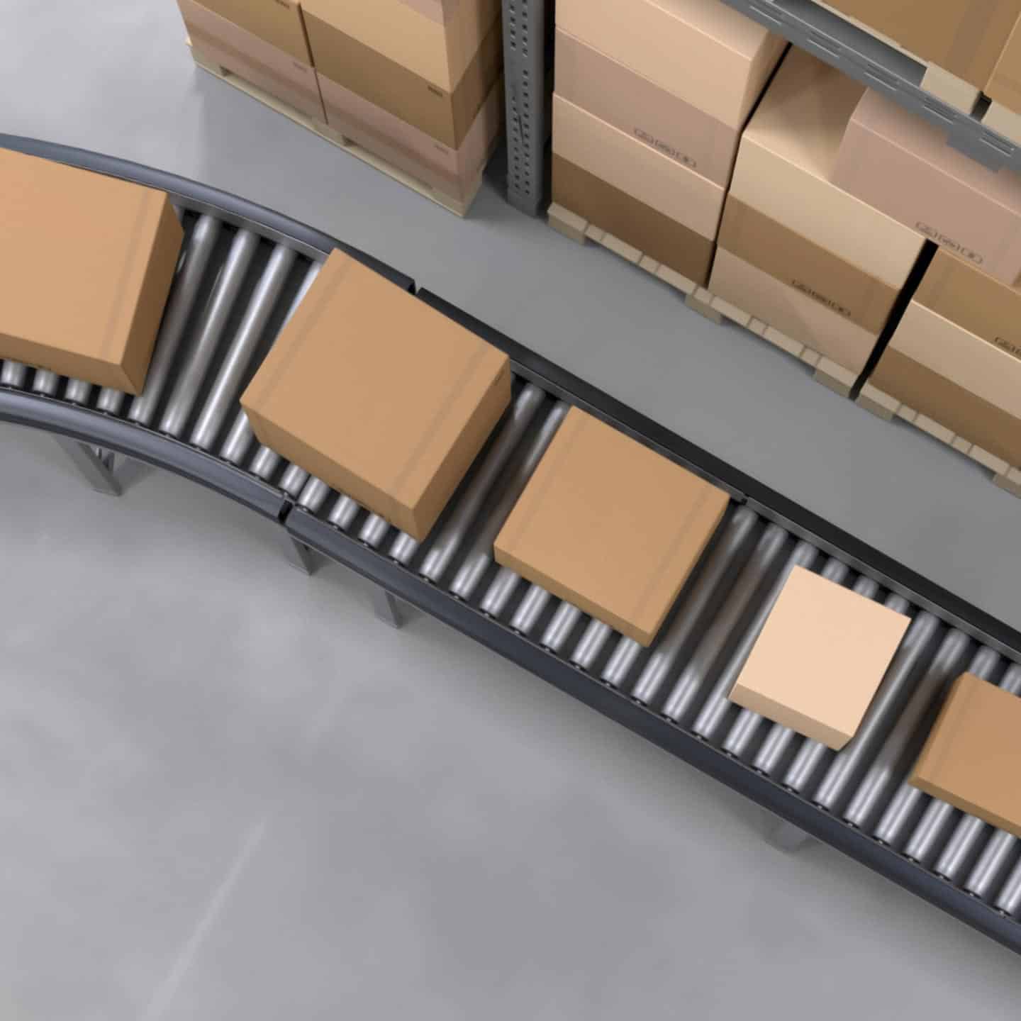A conveyor belt with boxes of consumer packaged goods on it in a warehouse.