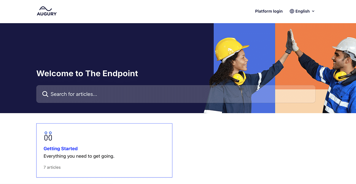 Homepage of Augurys support portal, featuring a search bar, two workers in safety gear high-fiving, and a highlighted Getting Started section for helpful articles. Platform login and language options appear at the top right.