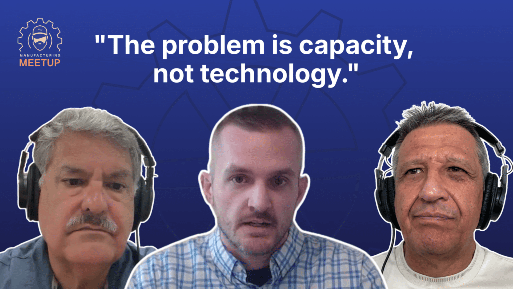 Three men wearing headsets are shown in front of a blue background with a gear graphic, symbolizing the integration of manufacturing AI. Large text reads: The problem is capacity, not technology.