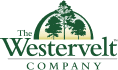 Logo of The Westervelt Company, featuring two green trees inside a green arch above the company name in green and yellow text.